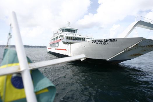 salvador, bahia, brazil - august 19, 2014: Dorival Caymmi ferry boat near Terminal de Sao Joaquim in Salvador. sweaty vessel for the crossing to the island of Itaparica.