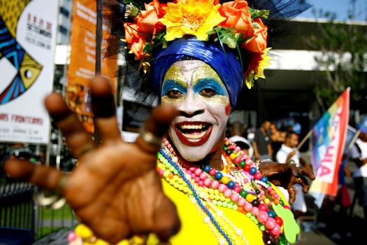 salvador, bahia / brazil - september 21, 2014: person is seen wearing costume during parade of gay parade in the city of Salvador.