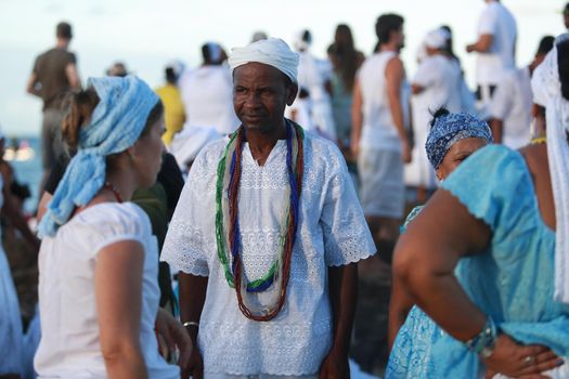 salvador, bahia, brazil - february 2, 2015: Candomble devotees and supporters of the African matriaz religion pay tribute to the orixa Yemanja in the city of Salvador.