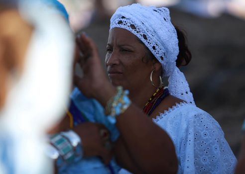 salvador, bahia, brazil - february 2, 2015: Candomble devotees and supporters of the African matriaz religion pay tribute to the orixa Yemanja in the city of Salvador.