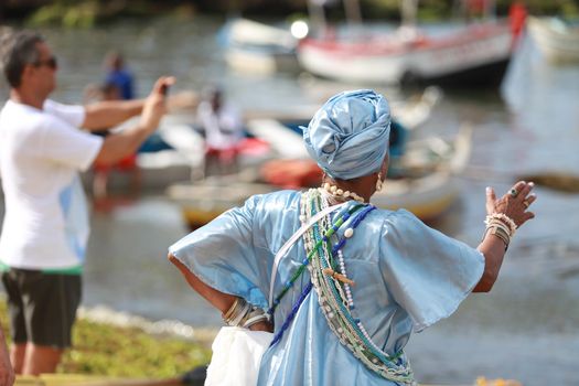 salvador, bahia, brazil - february 2, 2015: Candomble devotees and supporters of the African matriaz religion pay tribute to the orixa Yemanja in the city of Salvador.