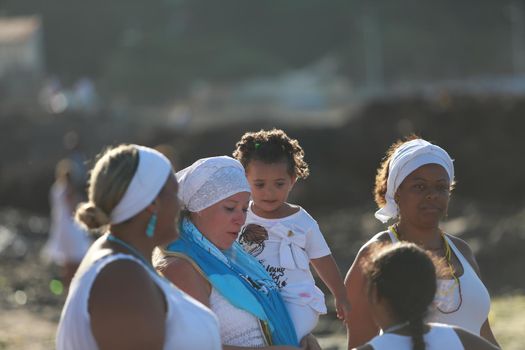 salvador, bahia, brazil - february 2, 2015: Candomble devotees and supporters of the African matriaz religion pay tribute to the orixa Yemanja in the city of Salvador.