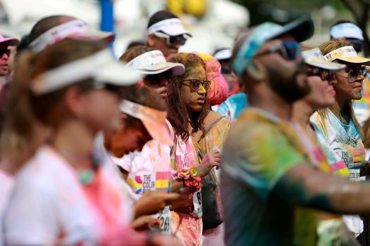 salvador, bahia / brazil - March 22, 2015: People are spotted during The Color Run street race at the Torroro Dike in Salvador.