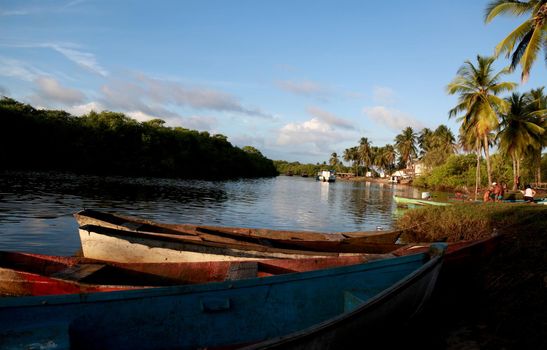 conde, bahia / brazil - march 28, 2013: Fishing boats are seen in the Itapicuru River port in the Pocas community, Conde municipality.


 