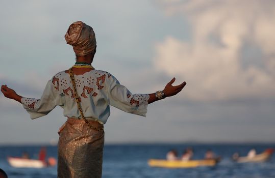 salvador, bahia, brazil - february 2, 2015: Candomble devotees and supporters of the African matriaz religion pay tribute to the orixa Yemanja in the city of Salvador.