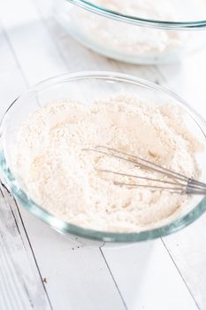 Preparing homemade pizza dough from all-purpose flour.