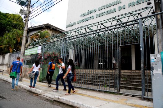 salvador, bahia / brazil - september 7, 2014: public school students are seen outside school in the city of Salvador.

