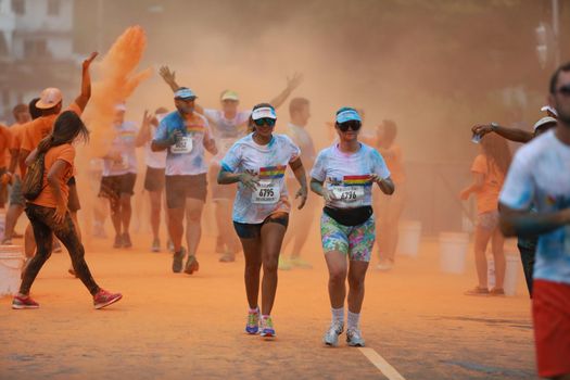 salvador, bahia, brazil - march 22, 2015: participant of the street race The Color Run at Dique de Torroro in the city of Salvador.