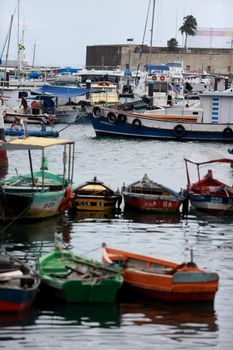 salvador, bahia / brazil - may 23, 2015: Boats are seen on the Modelo Market Ramp at Todos os Santos Bay in the city of Salvador.