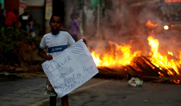 salvador, bahia / brazil - may 11, 2015: Residents of Salvador's Vila Sabino community protest against flooding of property due to clogged sewage channel.

