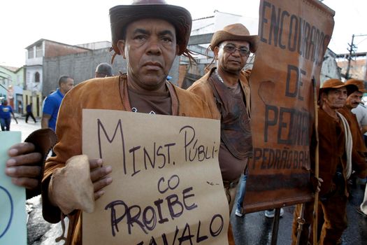 salvador, bahia / brazil - july 2, 2015: Cowboys protest the ban on the use of horses during the July 2 festivities, symbolizing the independence day of Bahia.