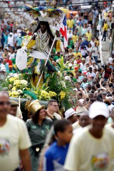 salvador, bahia / brazil - july 2, 2015: People accompany the departure of Caboclo and Cabocla from the Lapinha neighborhood during the July 2 celebrations, symbolizing Bahia Independence Day.