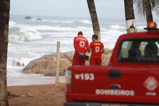 salvador, bahia / brazil - june 9, 2015: Members of the Bahia Fire Department are spotted astonishing missing persons at Stela Mares Beach in Salvador.