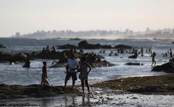 salvador, bahia / brazil - september 6, 2015: People are seen on rocks of Itapua Beach in Salvador.