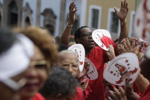 salvador, bahia, brazil - december 4, 2015: Santa Barbara devotees during Mass in Praised Santa at Largo do Pelourinho in Salvador city.