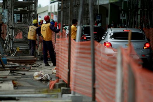 salvador, bahia / brazil - june 14, 2018: Workers are seen working on renovating the airport of the city of Salvador.
