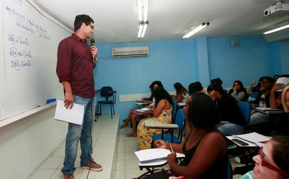 salvador, bahia / brazil - september 15, 2015: teacher is seen in the classroom in a preparatory course for public competition in the city of Salvador.