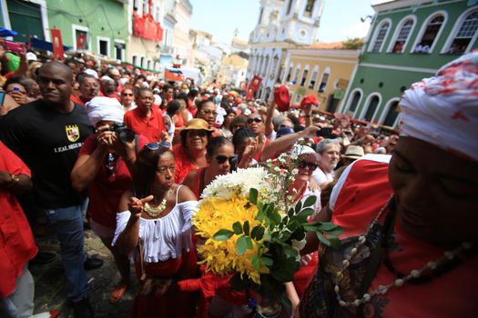 salvador, bahia, brazil - december 4, 2015: Santa Barbara devotees during Mass in Praised Santa at Largo do Pelourinho in Salvador city.