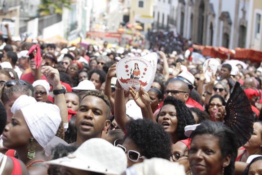 salvador, bahia, brazil - december 4, 2015: Santa Barbara devotees during Mass in Praised Santa at Largo do Pelourinho in Salvador city.