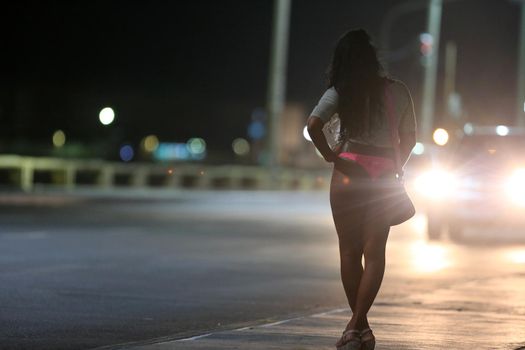 salvador, bahia / brazil - october 5, 2015: a transvestite who acts as a prostitute is seen on the street in the Pituba neighborhood in the city of Salvador.
