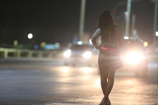 salvador, bahia, brazil - october 2, 2015: Trans woman working as a prostitute on a street in Salvador city.