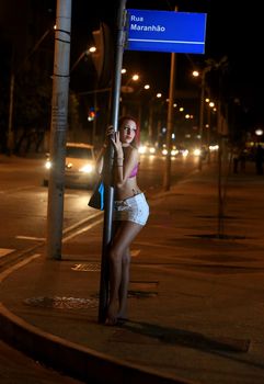 salvador, bahia / brazil - october 5, 2015: a transvestite who acts as a prostitute is seen on the street in the Pituba neighborhood in the city of Salvador.
