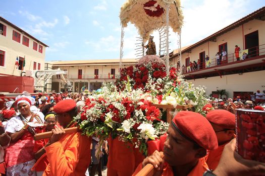 salvador, bahia, brazil - december 4, 2015: members of the Fire Department carry image of Santa Barbara during festivities in the city of Salvador.