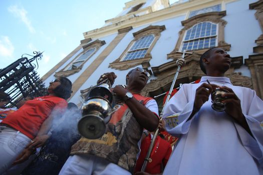 salvador, bahia, brazil - december 4, 2015: Santa Barbara devotees during Mass in Praised Santa at Largo do Pelourinho in Salvador city.