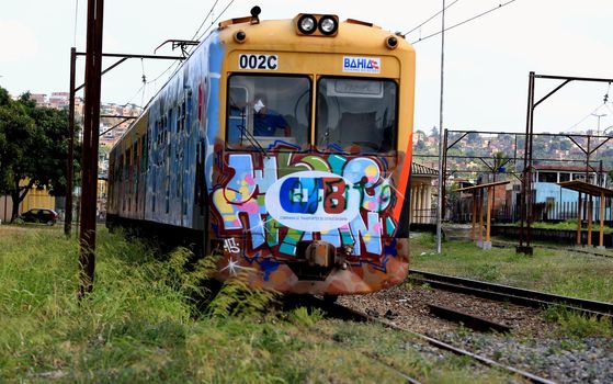 salvador, bahia / brazil - november 23, 2015: suburban train is seen passing through the Lobato neighborhood in the city of Salvador.