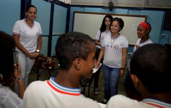 salvador, bahia / brazil - october 18, 2015: Public school students are seen in the Romulo Almeida School classroom in the Imbui neighborhood of Salvador.