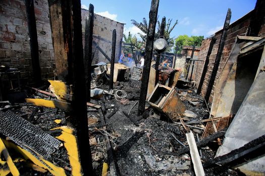 salvador, bahia / brazil - october 22, 2015: View of houses burned down by drug traffickers in the town known as Cidade de Plástico in the Periperi neighborhood of Salvador.