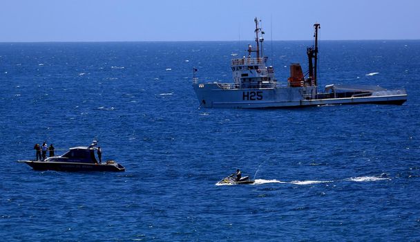 salvador, bahia / brazil - november 4, 2015: NB Tenente Boanerges (H-25), Brazilian Navy flagship ship is seen at sea near the Barra lighthouse in the city of Slavdor.







