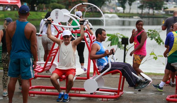 salvador, bahia, brazil - september 1, 2015: people practicing physical activity in an outdoor gym at Dique de Itororo in the city of Salvador.