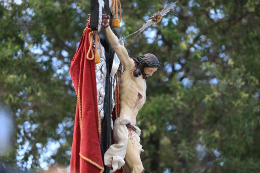 salvador, bahia, brazil - january 1, 2016: image of the good jesus of the navigators being carried by devotees to a maritime procession in the Baia de Todos os Santos in the city of Salvador.