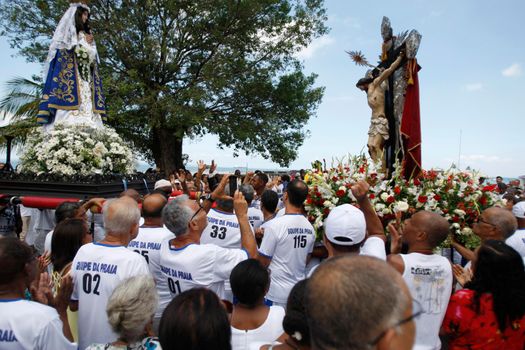 salvador, bahia, brazil - january 1, 2016: image of the good jesus of the navigators being carried by devotees to a maritime procession in the Baia de Todos os Santos in the city of Salvador.