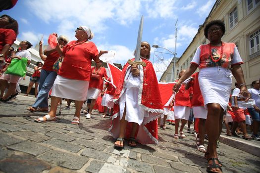 salvador, bahia, brazil - december 4, 2015: Santa Barbara devotees during Mass in Praised Santa at Largo do Pelourinho in Salvador city.