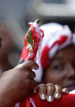 salvador, bahia, brazil - december 4, 2015: Santa Barbara devotees during Mass in Praised Santa at Largo do Pelourinho in Salvador city.