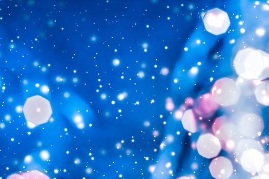 Christmas lights, New Years Eve fireworks and abstract texture concept - Magic sparkling shiny glitter and glowing snow, luxury winter holiday background