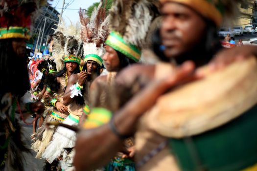 salvador, bahia, brazil - january 24, 2016: Members of the cultural group Os Guaranis, from Ilha de Itaparica are seen during a girth walk in the city of Salvador.