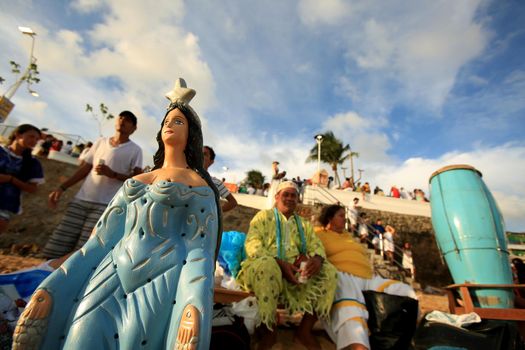 salvador, bahia, brazil - february 2, 2017: Candomble members and admirers of the Orixa Yemanja during a religious ritual in the city of Salvador.