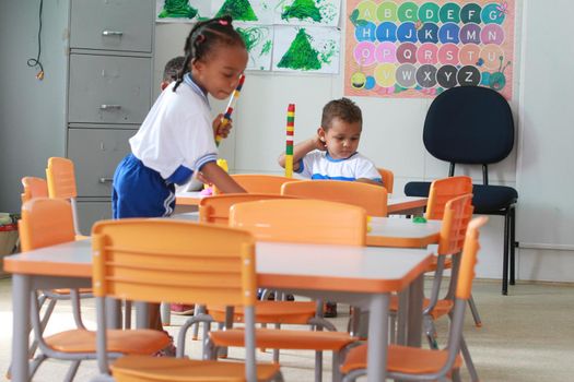 salvador, bahia / brazil - may19, 2016: children are seen in a classroom at the Tereza Mata Pires Municipal Center, in the Alto do Cabrito neighborhood in the city of Salvador.


