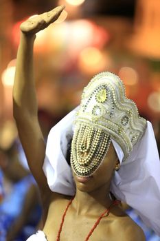 salvador, bahia - brazil - march 4, 2016: members of the carnival block Afoxe Laroye are seen wearing Orix costumes from Candomble at Circuito Batatinha (Pelourinho) during the carnival in the city of Salvador.