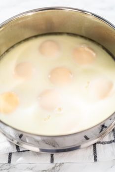 Cook no-peel hard-boiled eggs in a pressure cooker.