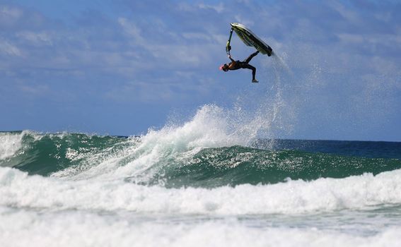 salvador, bahia / brazil - july 13, 2016: Bruno Jacob, watercraft rider is seen during Jetwaves training at Stella Maris beach in Salvador.