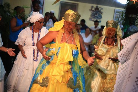 simoes filho, bahia, brazil - february 27, 2016: followers of candomble religion during religious festivities in a cndomble yard in the city of Simoes Filho.