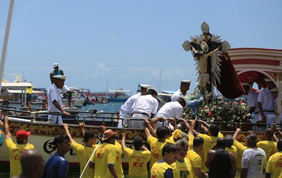 salvador, bahia / brazil - january 1, 2016: image of Bom Jesus dos Navegantes leaves the Galeota Gratidao do Povo after sailing in a maritime procession through the Baía de Todos os Santos, in the city of Salvador.
