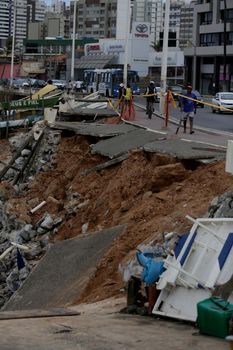 salvador, bahia / brazil - may 30, 2017: View of destruction caused by the force of the tide on the pedestrian sidewalk and bike lane area in the neighborhood of Pituba in the city of Salvador.