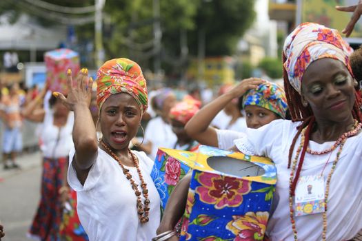 salvador, bahia / brazil - february 24, 2017: Members of The Itapua Ganhadeiras Cultural Group are seen during presentation at the Carnival in the city of Salvador.
