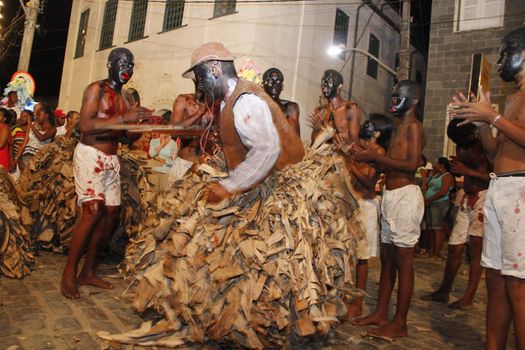 santo amaro, bahia, brazil - january 25, 2013: young people make the enactment of nego fugido, a cultural event that simulates escaped slaves from captivity in the city of Santo Amaro.