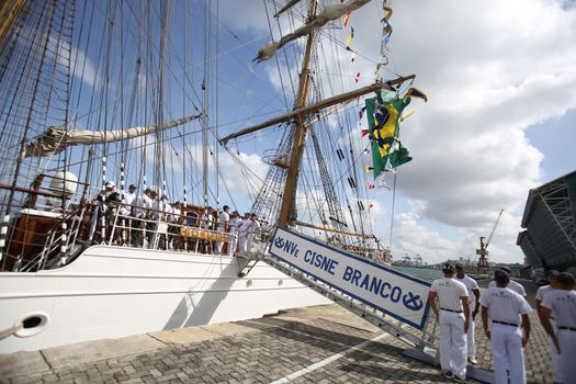 salvador, bahia, brazil - October 19, 2018: Crew of the White Swan ship is seen during operation on the vessel in Todos os Santos Bay.
